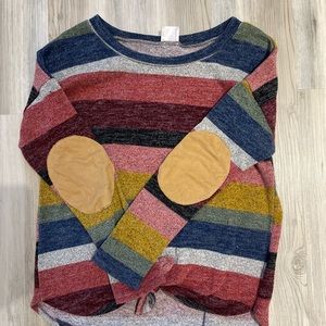Striped sweater with elbow patches.